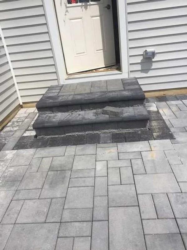Patios featuring integrated steps with paver finish in Newark, Delaware